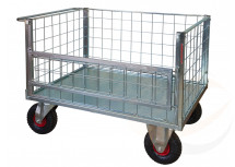 Pianale a 4 sponde di cui 1 ribaltabile in rete con ruote pneumatiche